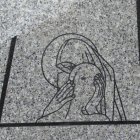 Poświęcenie pomnika upamiętniającego ofiary II Wojny Światowej na cmentarzu w Brzeziu. 